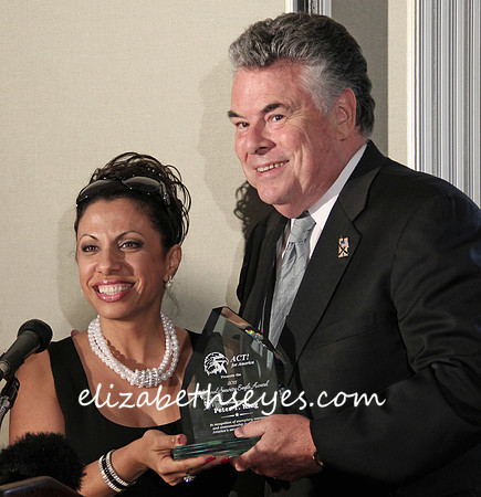 Brigitte presenting Congressman Peter King (R NY) with his National Security Patriot Award